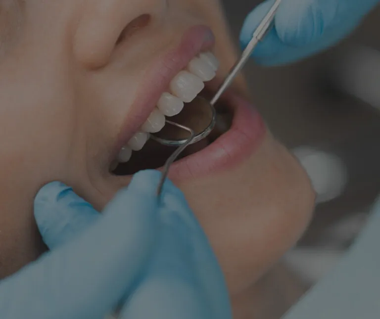 Dentist performing a dental exam